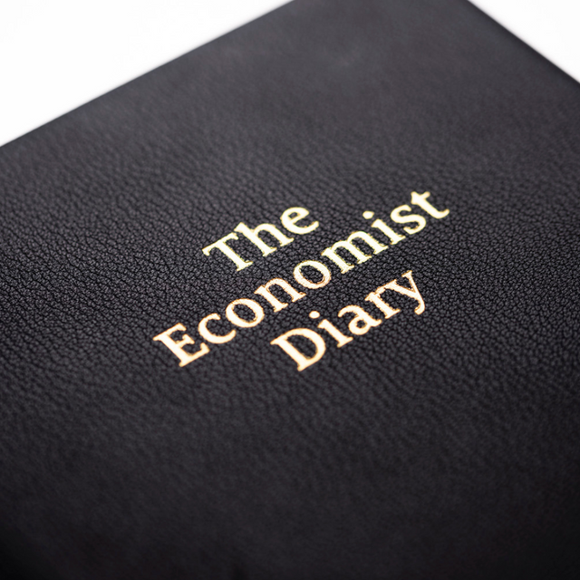 The Economist - 2027 Calendar Year Planner – 12 Month (260 x 210mm) Week-to-View Diary – Luxury Leather Cover in Black - The Economist Desk Diary Range (EDDBLK-27)