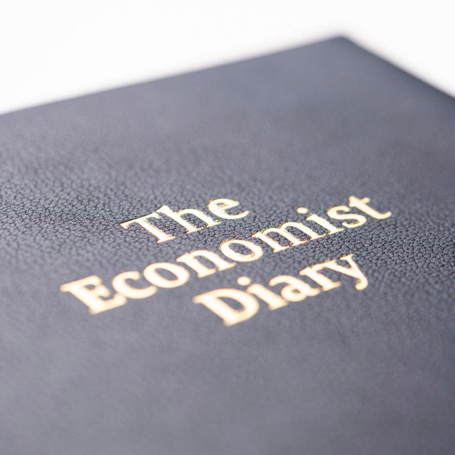 The Economist - 2027 Calendar Year Planner –  12 Month (260 x 210mm) Week-to-View Diary – Luxury Leather Cover in Blue - The Economist Desk Diary Range (EDDBLU-27)